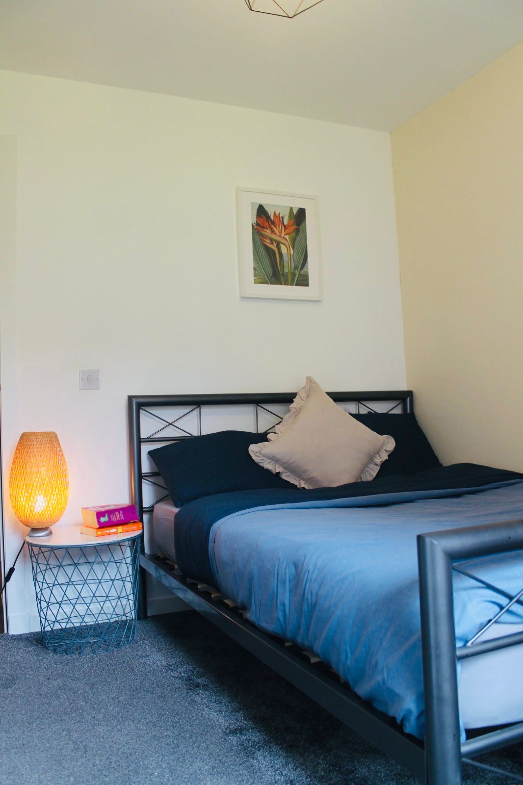 Bedroom with blue bedding